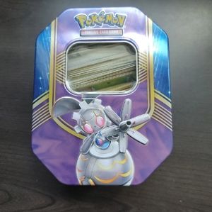 Pokemon Trading Card Game Tin Container holding 200 common cards plus coin